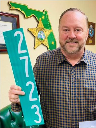 Sheriff Smith displays a reflective address sign